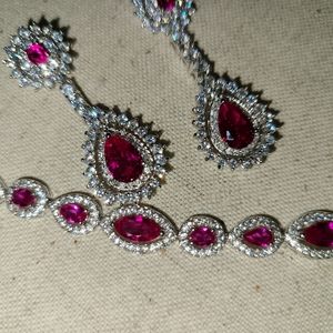 Set of pink earrings and bracelet